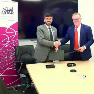 Ali Al Khalifa, CEO of Astad (left) shakes hands with Finlay Cumming, CEO of Cumming after the signing ceremony.