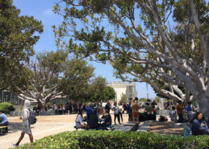Outdoor campus scene at Santa Monica-Malibu Unified School District with students and faculty.