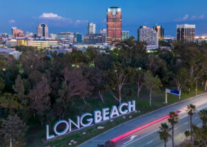 Aerial view of Long Beach with prominent green spaces and urban developments.